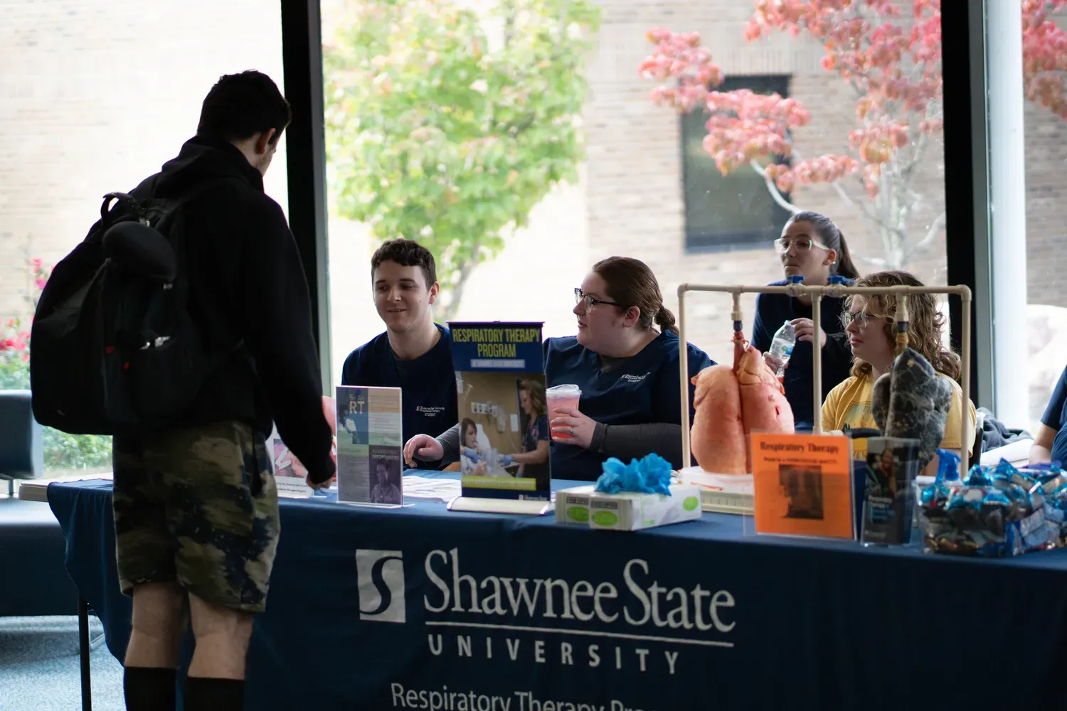 Students interacting at the health fair