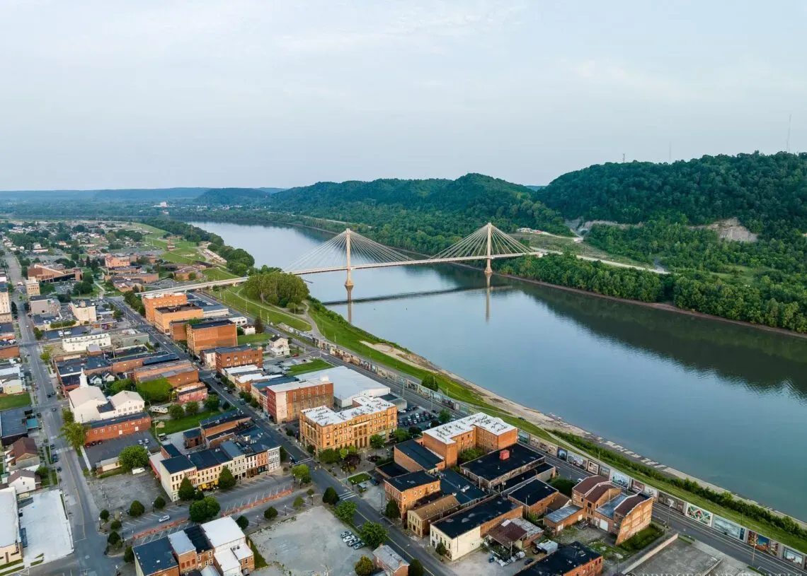 Drone shot of campus and the river