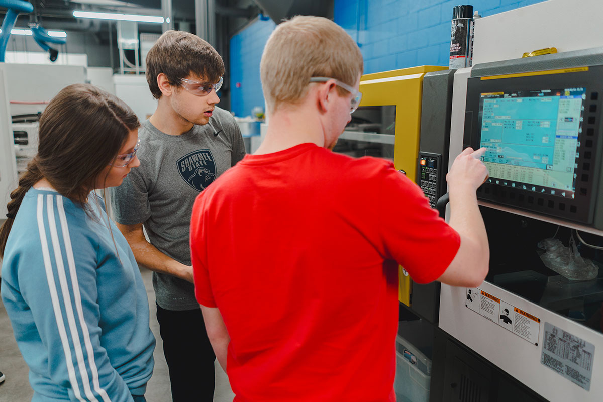Students working in the plastics lab