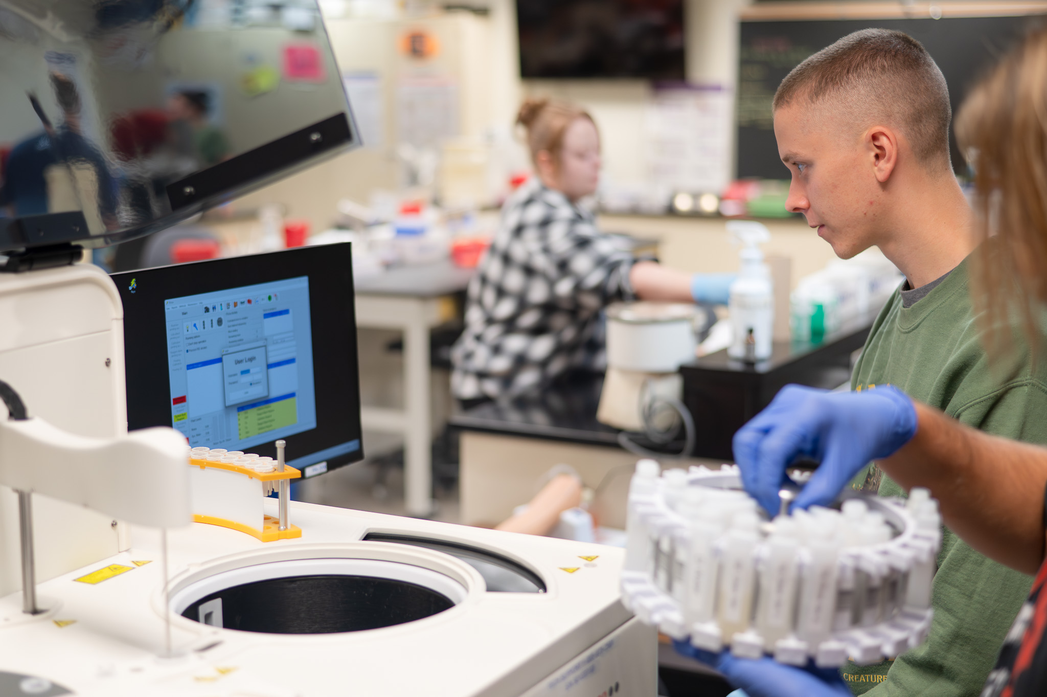 second angle of MLT students using the Diatron Pictus 500 in the lab