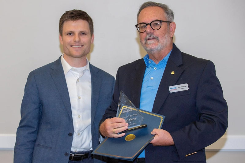 Director of the Shawnee State University Kricker Innovation Hub, David Kilroy (left) receives the 2022 Chamber Member of the Year Award, presented by Chamber Board Member Stan Jennings (right).