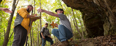 students in forest on geology trip