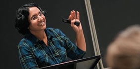 Dr. Lavanya Vemsani teaching at podium