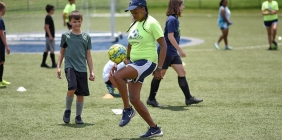 photo of woman demonstrating soccer skills