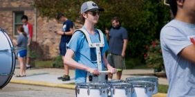 person playing drums in parade